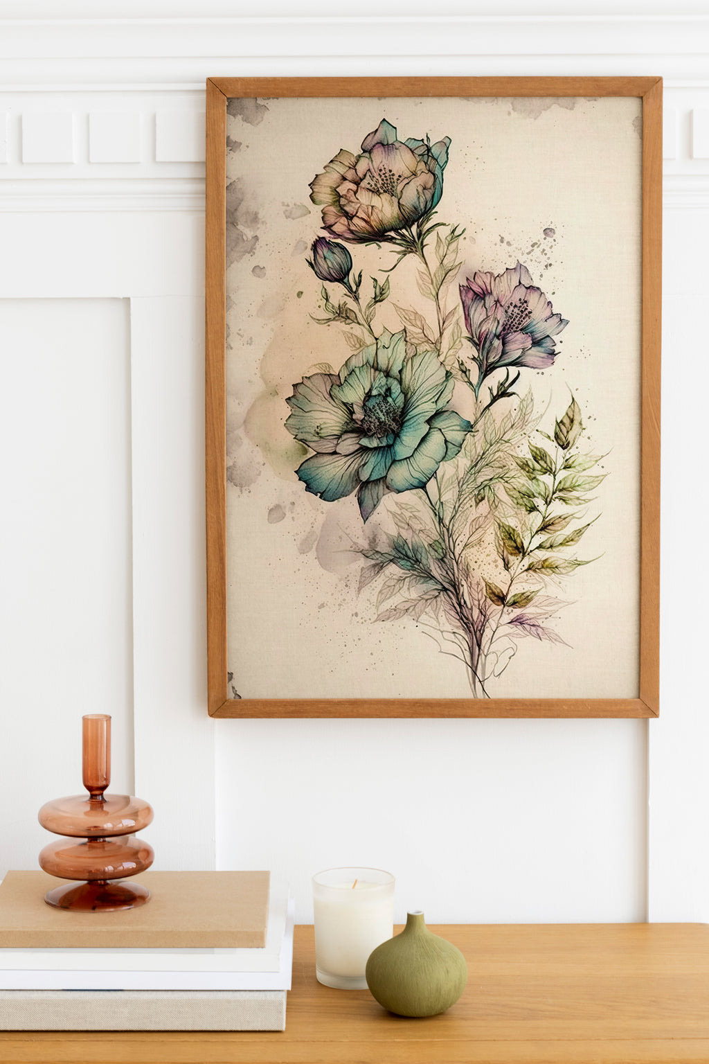a framed print of a floral illustration hanging on a wall above a wooden table with various decorative items on it.