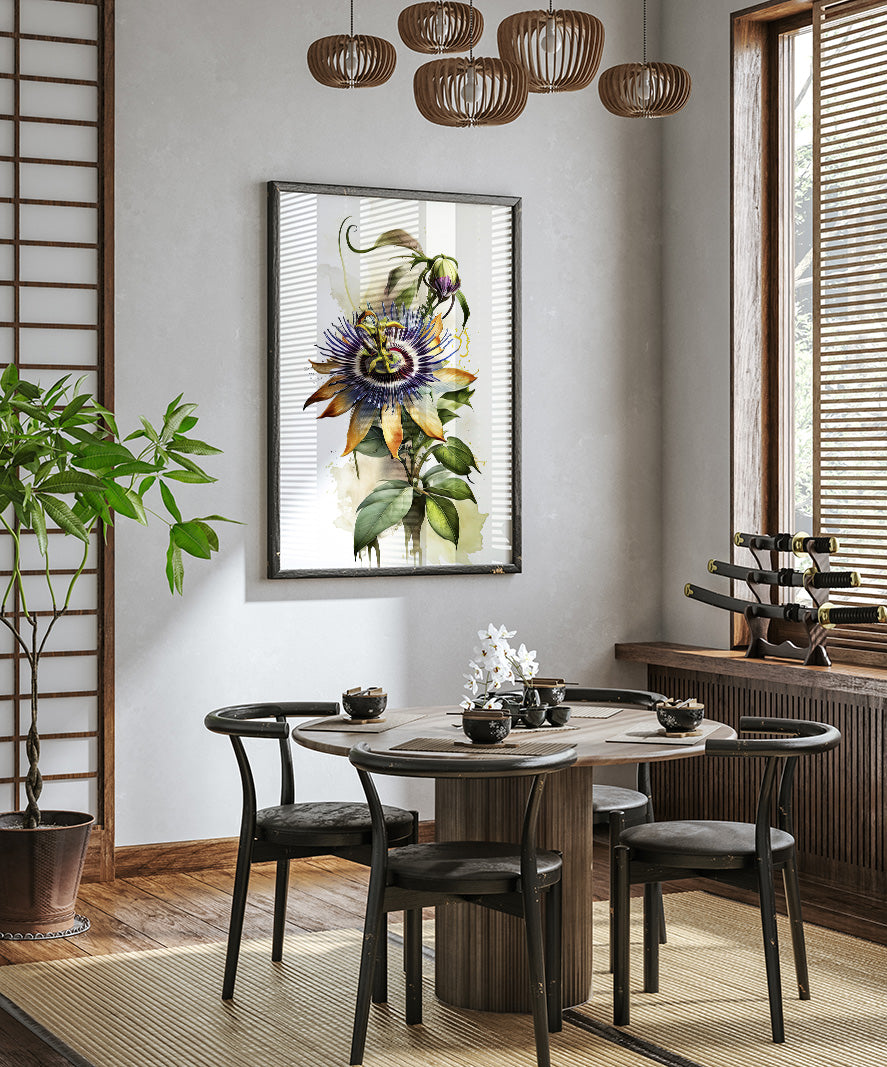 a modern dining room with a round wooden table surrounded by black chairs. A large floral painting hangs on the wall above the table, and a potted plant is placed on the left side of the room. The room has a minimalist and elegant design, with a chandelier hanging from the ceiling and a window providing natural light.