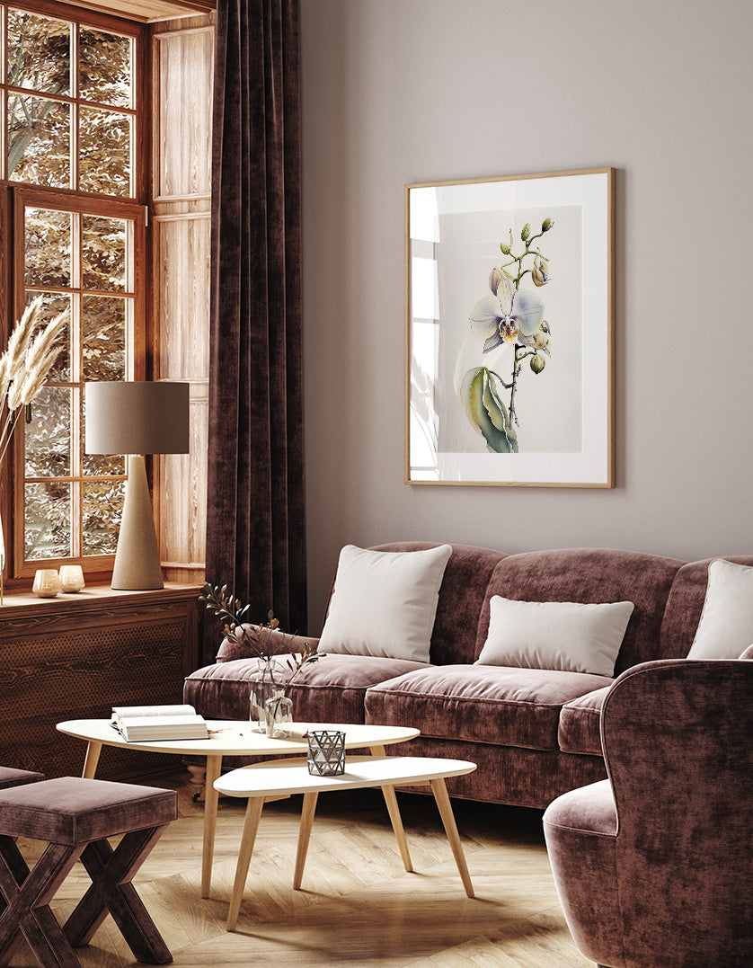 a cozy living room with a large window, a plush brown sofa, a wooden coffee table, and a framed painting of a plant on the wall.