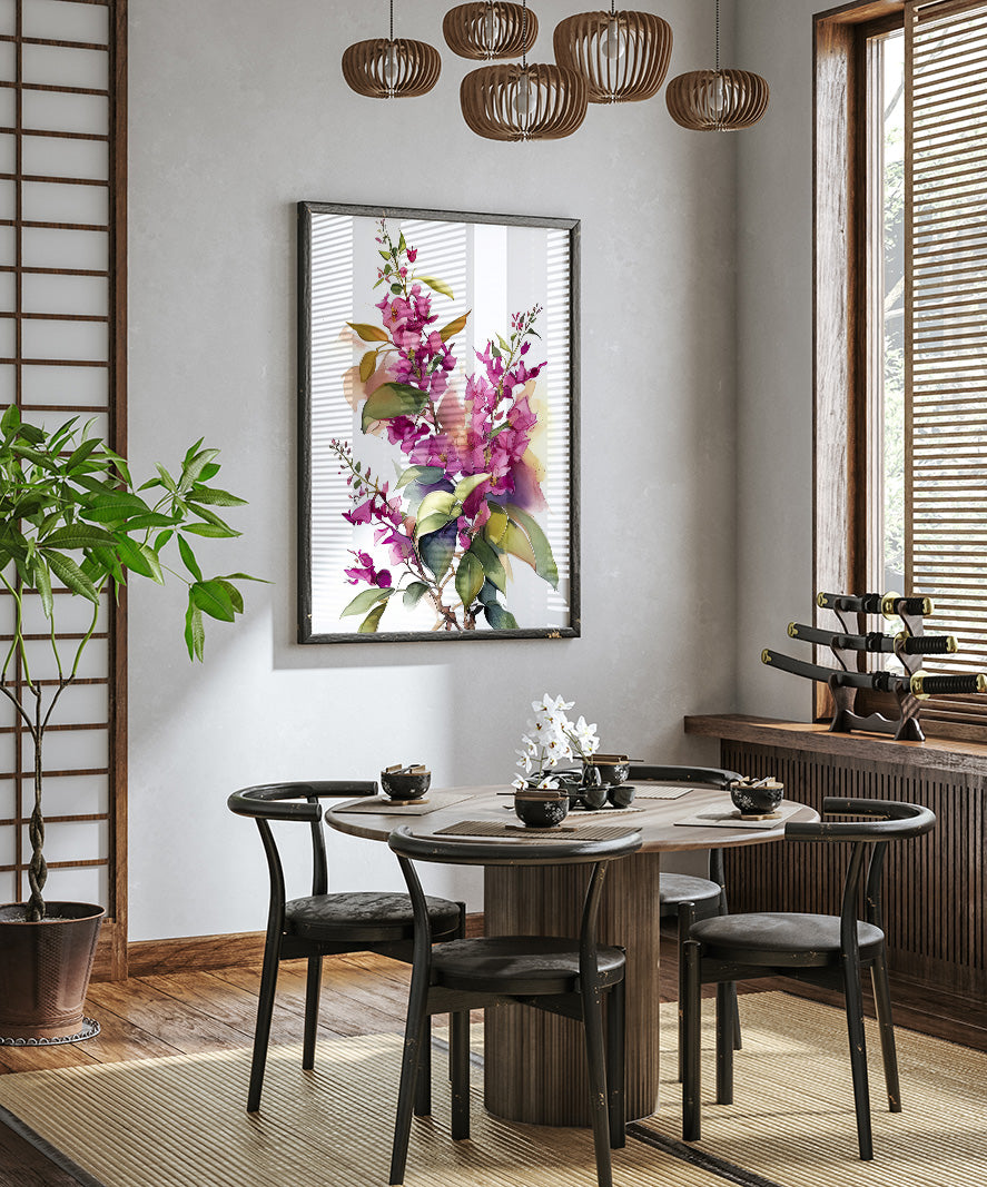 a modern dining room with a round wooden table surrounded by black chairs. A large floral painting hangs on the wall above the table, and a potted plant is placed on the left side of the room. The room has a minimalist and elegant design, with a chandelier hanging from the ceiling and a window with blinds on the right side.