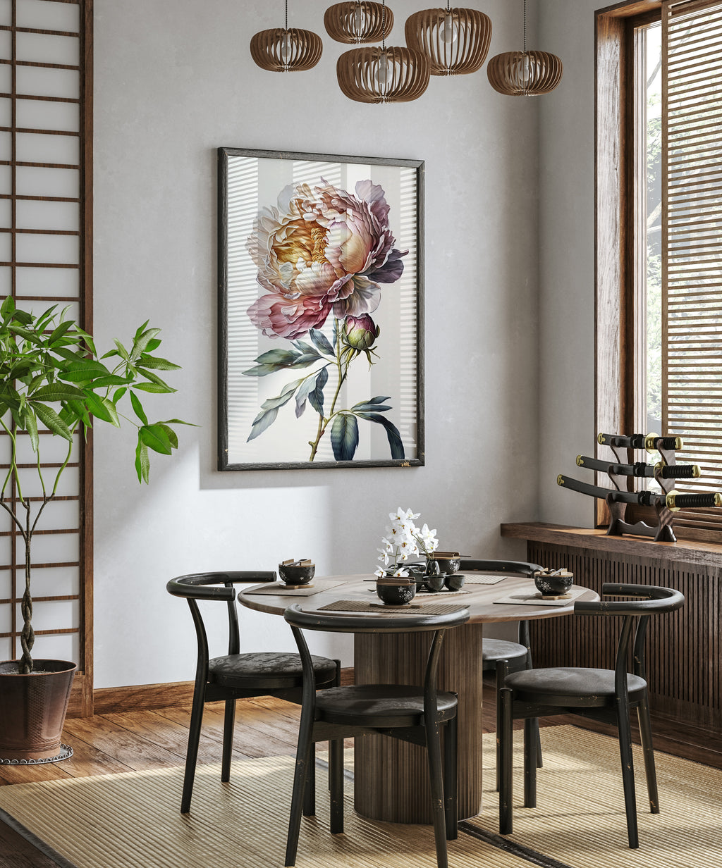 a modern dining room with a round wooden table surrounded by black chairs. A large floral print hangs on the wall above the table, and a potted plant is placed on the left side of the room. The room has a minimalist and elegant design, with a chandelier hanging from the ceiling and a window providing natural light.
