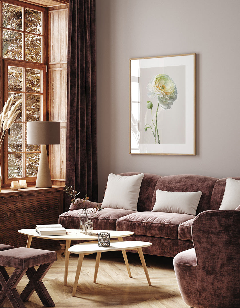 a cozy living room with a large window, a brown sofa, a wooden coffee table, and a framed picture of a flower on the wall.