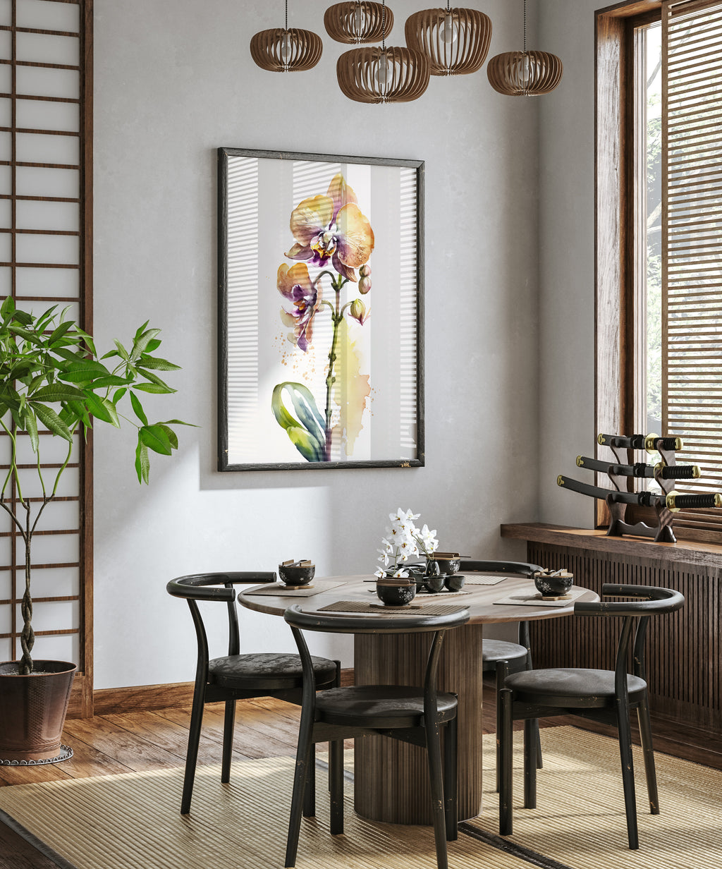 a modern dining room with a round wooden table surrounded by black chairs. A large painting of an orchid is hanging on the wall above the table, and a chandelier is hanging from the ceiling. The room is decorated with a potted plant, a vase of flowers, and a collection of wine glasses on the table.