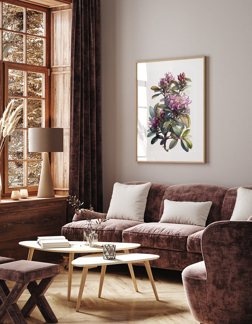 a cozy living room with a large window, a brown sofa, a wooden coffee table, and a framed floral artwork on the wall.