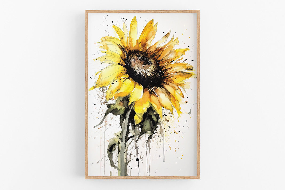 A framed watercolor painting depicting a vibrant yellow sunflower with a brown center, surrounded by splashes of color.